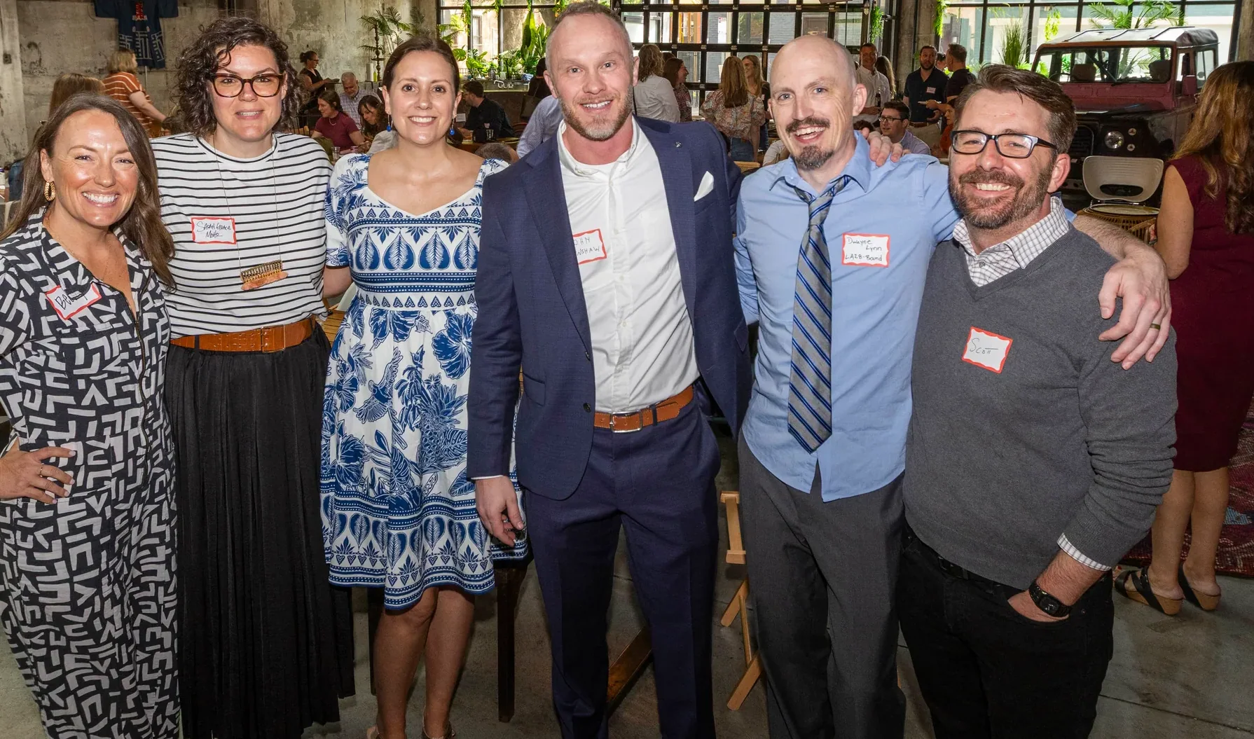 The Envision Promotions team together at a partner event